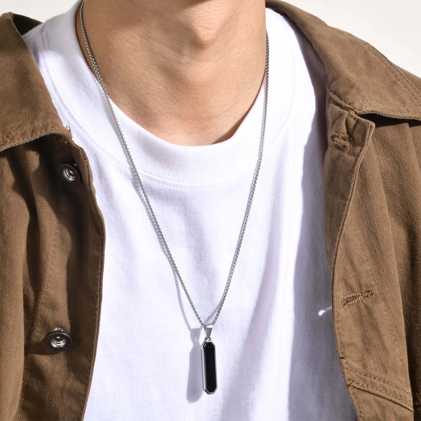 Royal Jewlz Darksteel Pendant: Exquisite metallic jewelry with intricate design and royal allure 